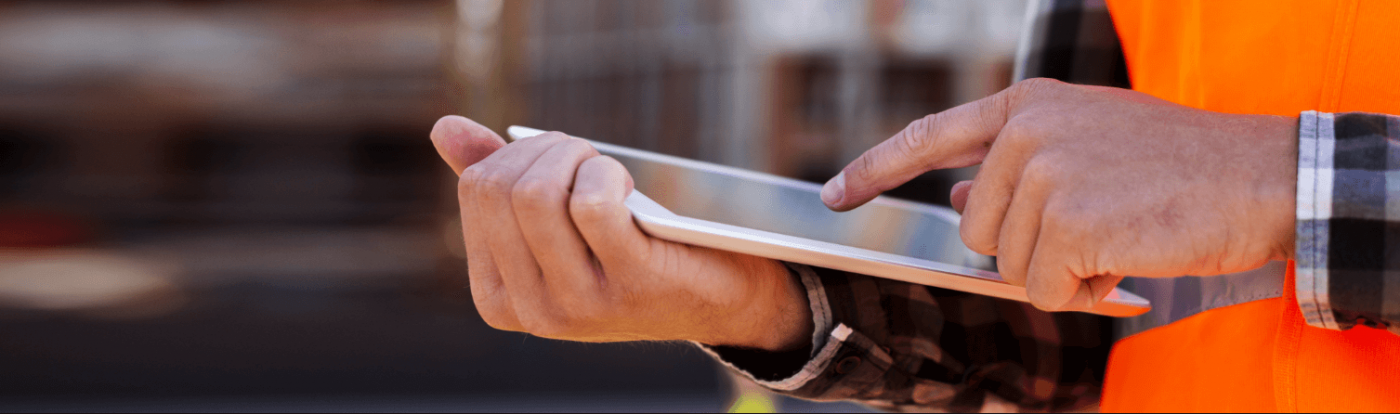 close up construction engineer using tablet